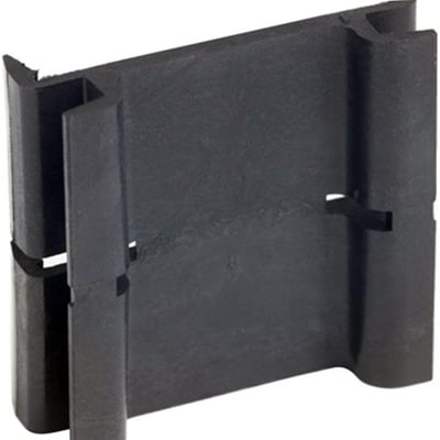 Detaljeret billede af Schneider Electric højdetilpasningsstykke GV1F, fokuserer på plastens tekstur og clipsmekanismen for montering.