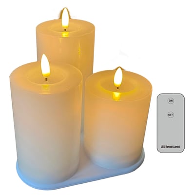 Tre hvide Veli Line LED-bloklys med 3D-flammer og fjernbetjening, vist samlet med lysene tændt.