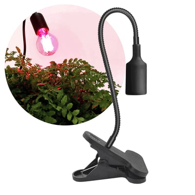 Sort Kobi PLANTY CLIP klemmelampe med fleksibel arm og E27-fatning lyser på planter med en grolyspære.