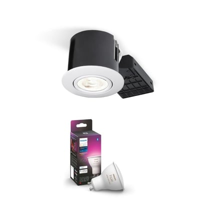 Philips Hue indbygningsspot, rund model, i mat hvid med en sort bagside, sat sammen med en Philips Hue Color & White Ambiance pære og emballage.