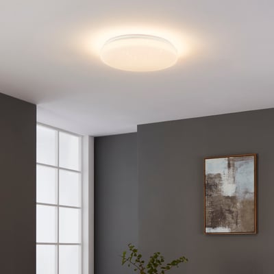 EGLO Totari-Z loftlampe med 380mm diameter, monteret i et moderne rum med dæmpet belysning, der viser dens lysende effekt.