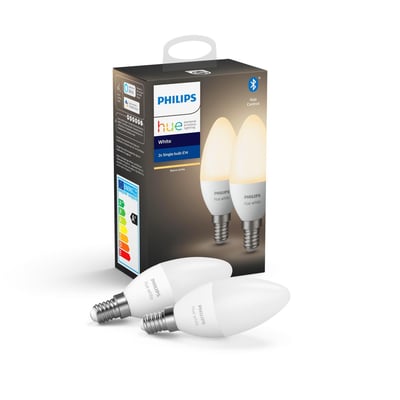 Philips Hue White E14 LED-kertepære med Zigbee ved siden af æsken, hvor pærerne og emballagen vises.