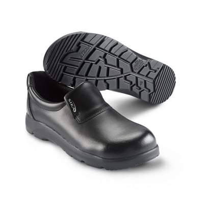 Sika Footwear Optimax S2 sikkerhedssko i sort læder, str. 41, vist med sålen opad, der viser skridsikre mønstre.