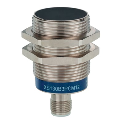 Schneider Electric induktiv føler M30 med sølvfarvet metalkabinet og sort induktionsflade. Føleren har M12 stik og mærkat med teksten XS130B3PCM12.