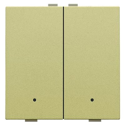 Niko 2-tryk i guld, vist fra siden for at demonstrere trykknappernes design og den integrerede sensor.