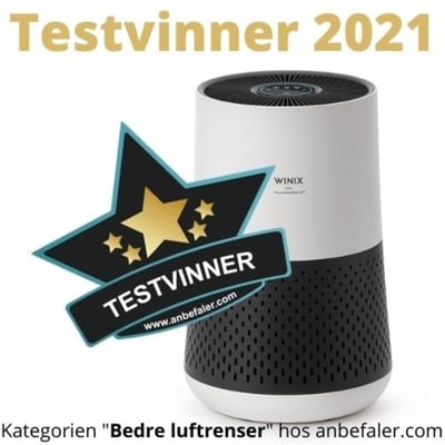 Winix Zero Compact luftrenser med "Testvinder 2021" stempel foran en hvid baggrund.