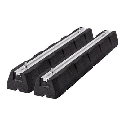 To gummi konsoller med montageskinne på 1000 mm længde. Viser vibrationsdæmpende gummi og metal skinne med bolte.