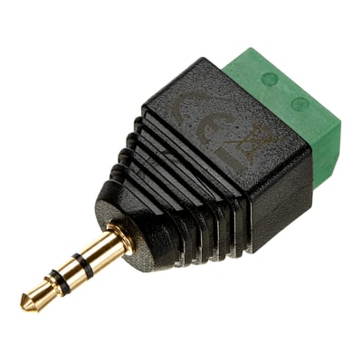 DeLock-adapter med sort 3,5 mm stereostik og grøn 3-polet terminalblok, set skråt med stikket synligt.