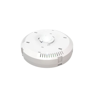 Undersiden af Ansell Lighting 'Panel Pod' selvtest nødlysmodul viser tilslutningsmekanisme og ventilationshuller.
