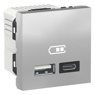 Schneider Electric New Unica USB-oplader NU301830 i aluminium med en standard USB-A port og en USB-C port. Opladeren har et batteri-ikon øverst og en hvid bagside.