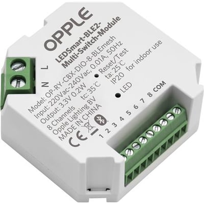 OPPLE Smart Lighting-modul LEDSMART-BLE2-Multi-Switch-Module set skråt ovenfra med grønne skrueklemmer.