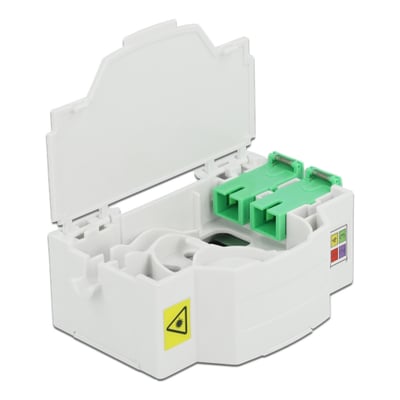 Åben DeLock fiberoptisk samledåse, der viser indvendige pladser til to grønne LC Duplex fiberadaptere.
