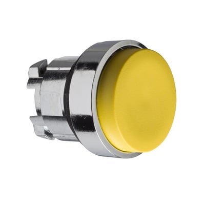 Ophøjet gul trykknap fra Schneider Electric, vist isoleret på hvid baggrund med synlig krom bezel.