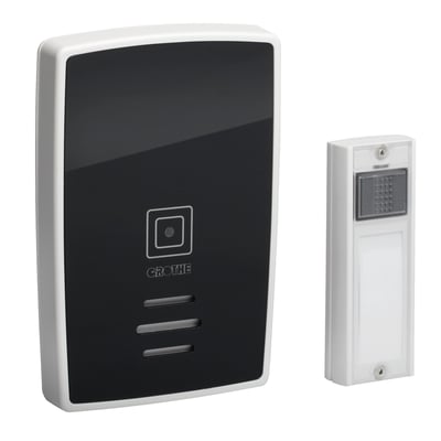 Grothe Polo 100 sort trådløs ringeklokke og trykknap med hvid ramme på hvid baggrund.