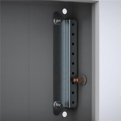 Eldon bundprofil H/B 150 i galvaniseret stål monteret inde i en grå kasse med bolte.