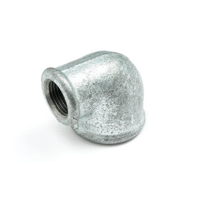 Unico vinkel 90 grader, reduceret type med 3/4" og 1/2" muffe gevind i galvaniseret metal.