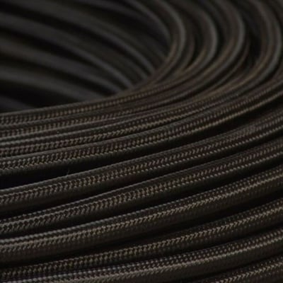 Sort stofledning VDH 2x0,75 mm² i en tæt samling, der viser den teksturerede overflade af stoffet.