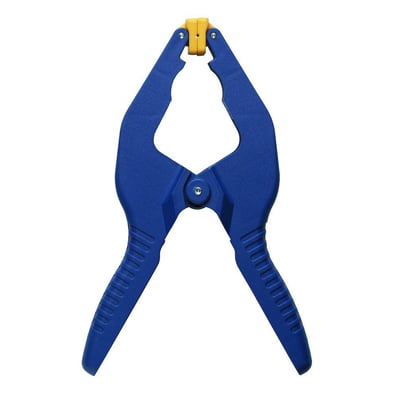 Blå Irwin Tools Quick-grip limklemme, 25 mm, med justerbare gule tryksko, vist på hvid baggrund.