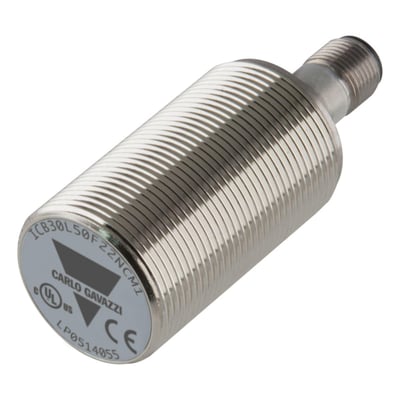 Carlo Gavazzi induktiv aftaster i M30-format med lang, cylindrisk metalhus og gevindtilslutning.
