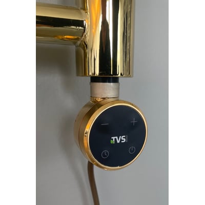 TVS varmelegeme til håndklædetørrer med guld PVD-finish og sort kontrolpanel med timer og termostat. Monteret på rør.