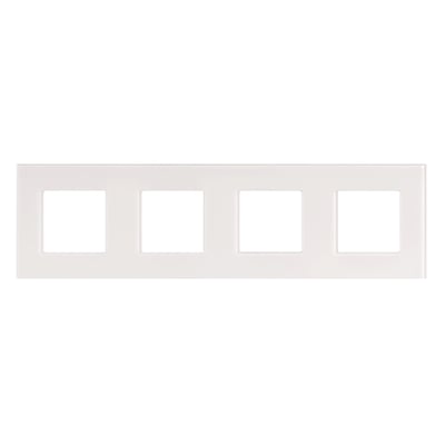 Hvid Niko afbryderramme med fire firkantede udskæringer til montering af afbrydere, neutral baggrund.