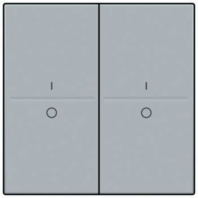 Niko tangent med I/O symbol til trådløs 4-tryk i sterling grå, der viser to trykflader med et 'I' og et 'O' symbol.