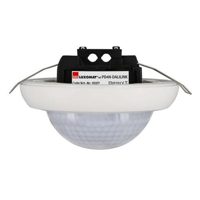 Detaljebillede af B.E.G. Multisensor PD4N-DaliLink-i, viser den runde hvide front og tilslutningsklemmerne bagpå.