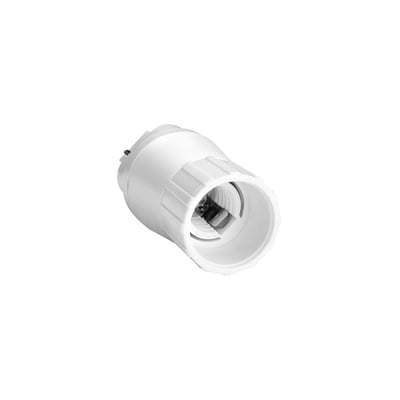 Hvid G24D til E14-adapter til 230 V, set skråt med E14-fatningens åbning vendt fremad.