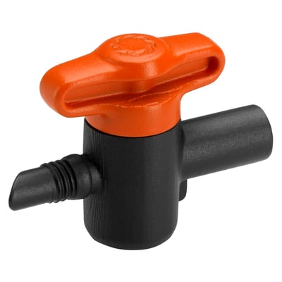 Nærbillede af Gardena Micro-Drip-System reguleringsventil med orange håndtag og sort ventilhus, klar til installation.