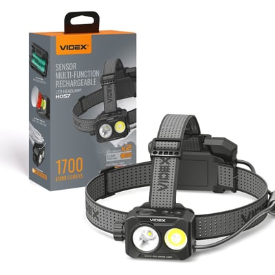 Videx LED-pandelampe med to lysfelter og elastisk rem ved siden af emballagen, angivet til 1700 lumen.