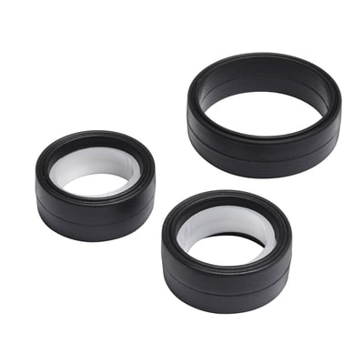 Gustavsberg pakningsringe til universal kartouche, tre sorte ringe med hvid plastindsats på hvid baggrund.