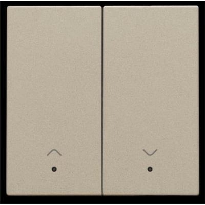 Niko smart motorbetjeningstangent i champagnefarve med dobbelttryksknap og linse samt pileikoner. Fremstår neutral og stilren.