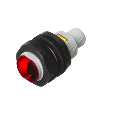 Carlo Gavazzi M18-fotoaftaster med refleksion, rød front, sort hus og grå gevinddel set skråt forfra.