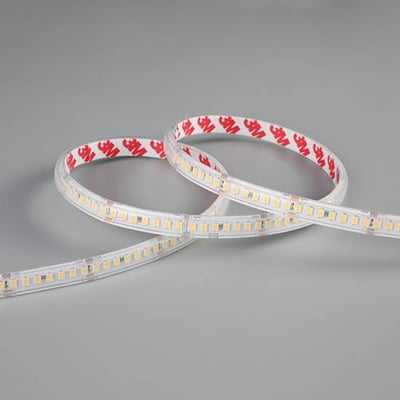 Ansell Lighting E-Cell Eco LED bånd på 10 meter med 24V spænding og 4000K hvidt lys. Båndet har IP65-klassificering og 3M tape på bagsiden.