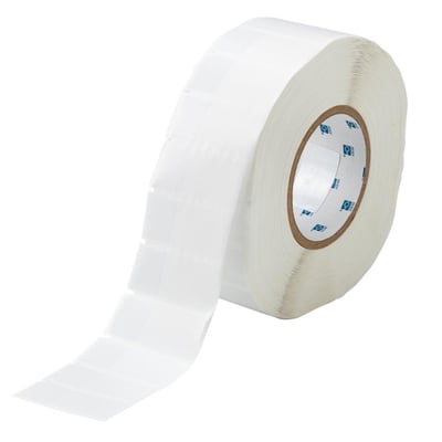 Rulle med blanke hvide og transparente ledningsetiketter fra Brady, model THT-64-427-3, på 57 x 25,4 mm.