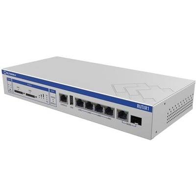 Teltonika RUTXR1 rackmonteret router i sølv med blå detaljer, viser frontpaneler med porte og SIM-slots.