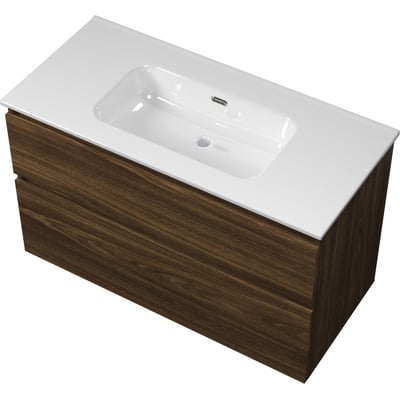 Sanibell Proline møbelsæt i cabana eg med to integrerede skuffer og hvid porcelænsvask. Møblet måler 101x46 cm.