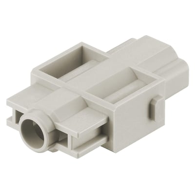 Lysegrå Harting 100A enkeltmodul stikindsats hun, vist isoleret på hvid baggrund, med fokus på dens form og stikåbning.