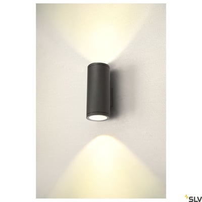 Antracitgrå, cylinderformet SLV Enola Round Up/Down L udendørs LED-væglampe monteret på væg og med lys opad og nedad.