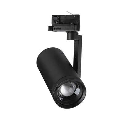 Sort V-TAC 30 W 3-faset skinnespot med cylinderformet lampehoved, synlig linse og skinneadapter.