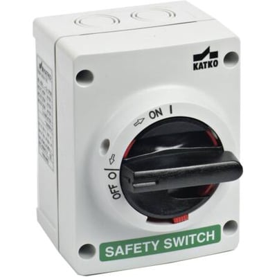 Katko reparationsafbryder i hvidt, firkantet kabinet med sort drejehåndtag og grøn mærkat 'SAFETY SWITCH'.