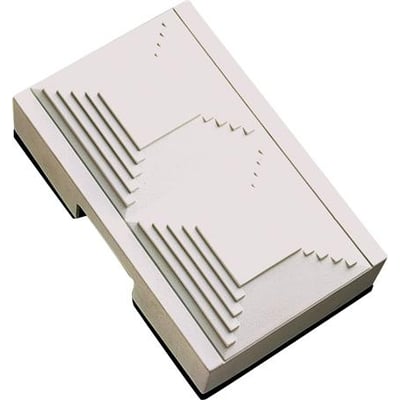 Dinuy Luxor mekanisk dørklokke med to toner, hvid front og sort bund, set skråt oppefra.