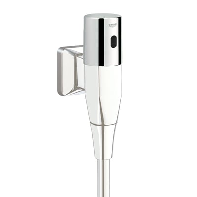 Grohe Tectron urinal overdel med krom finish monteret på en hvid væg, med synlig sensor og batteridæksel.