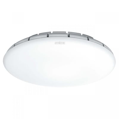 Steinel RS PRO S10 LED-armatur med 9,1W og 3000K, fladt design i hvid plast med kølerlameller i toppen.