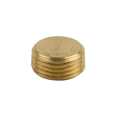 Afslutningsprop til radiator i messing med 1/2" gevind og hul til Unbrako nøgle, isoleret på hvid baggrund.
