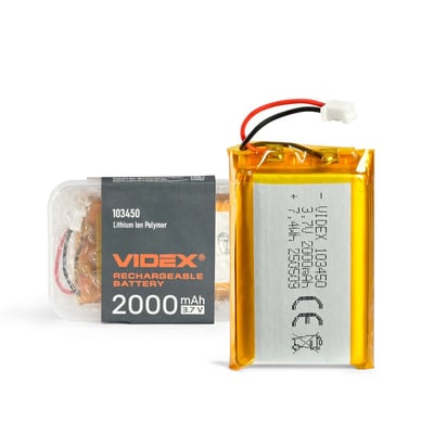 Genopladeligt Videx Li-pol-batteri på 2000 mAh med orange folie, ledninger og stik ved siden af emballagen.