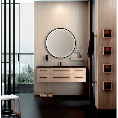 Elegant Dansani Hydra håndklædetørrer i krom monteret ved siden af et moderne badeværelsesmøbel med spejl og vask.