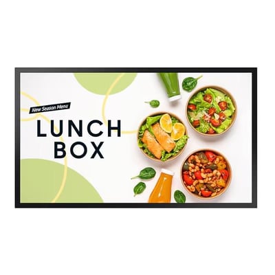 Samsung OM32DX 32-tommers FHD-skærm set forfra med sort ramme og en farverig madmenu på skærmen.
