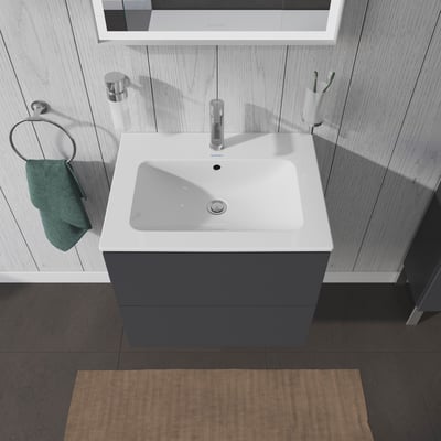 Ovenfra-perspektiv af Duravit L-Cube underskab i mørkegrå med porcelænsvask og armatur, integreret i et moderne badeværelsesmiljø.