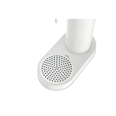 Nærbillede af den hvide Philips sodavandsmaskines bund med drypbakke og perforeret overflade.